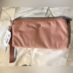 Lululemon Curved Wristlet NWT in Pink Pastel